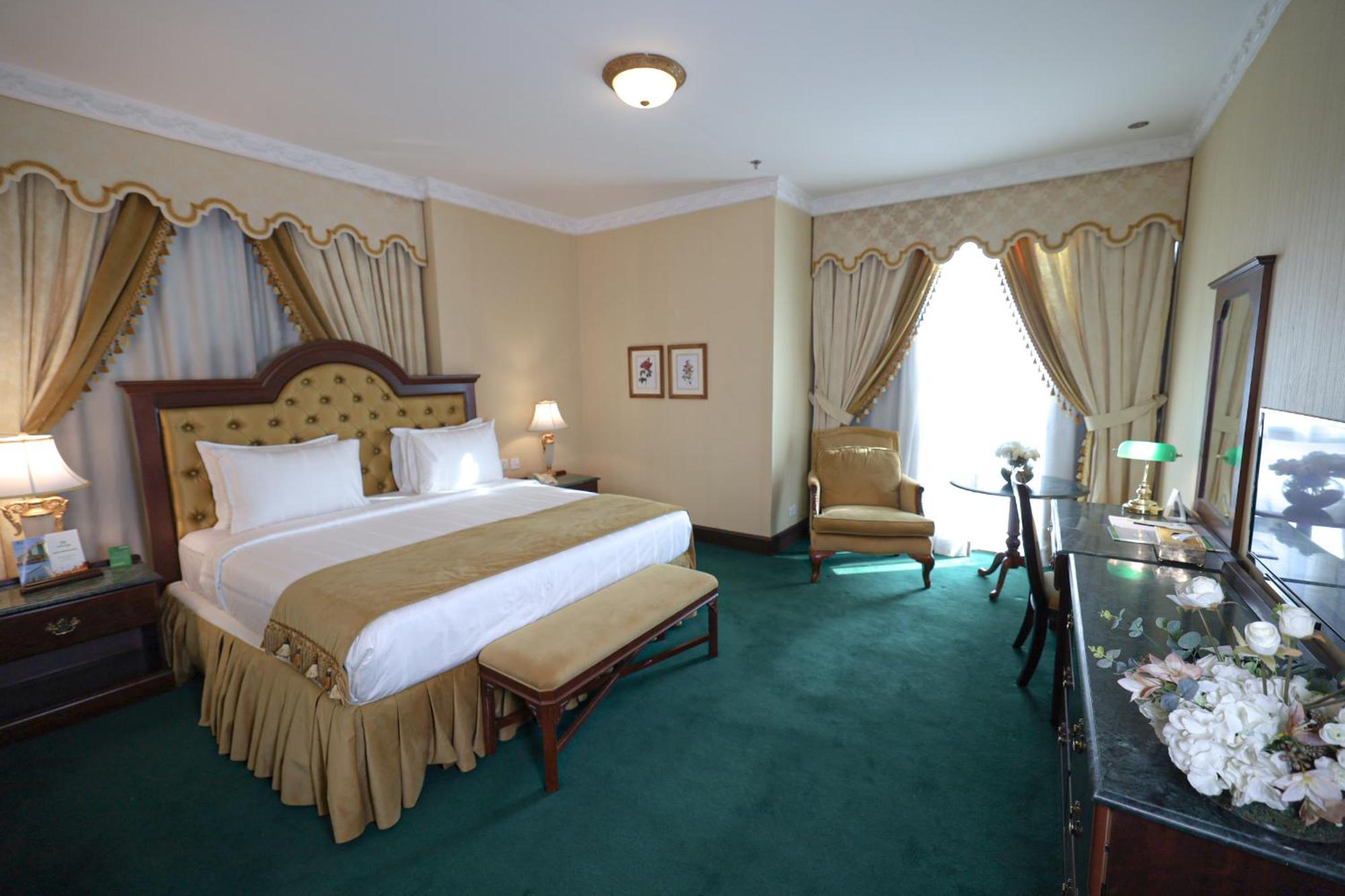 胡拜尔全套房酒店 阿可贺巴 外观 照片 A bedroom at the hotel