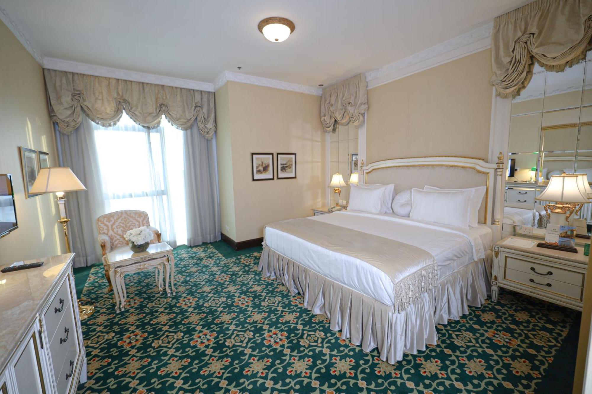 胡拜尔全套房酒店 阿可贺巴 外观 照片 A bedroom at the hotel